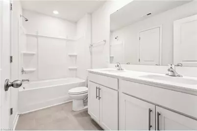 7058 Eclipse Trail, Whitsett, NC 27377 - Photo 11