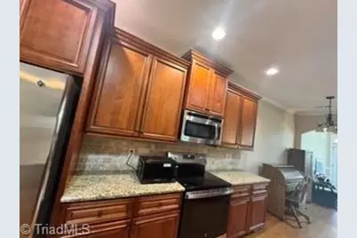 1907 Whisper Lake Drive #B, Whitsett, NC 27377 - Photo 9