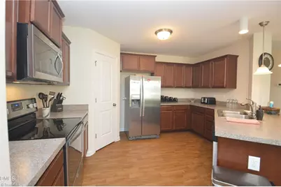 7505 Oliver Park Drive, Whitsett, NC 27377 - Photo 13