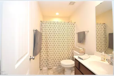 7505 Oliver Park Drive, Whitsett, NC 27377 - Photo 19