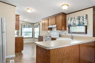 4411 Saddlebranch Dr, Gibsonville, NC 27249 - Photo 11