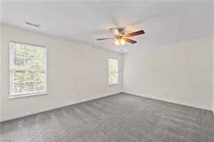 693 Triple Crown Ct, Whitsett, NC 27377 - Photo 15