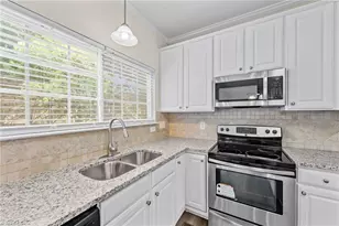 693 Triple Crown Ct, Whitsett, NC 27377 - Photo 7