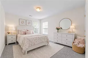 693 Triple Crown Ct, Whitsett, NC 27377 - Photo 21