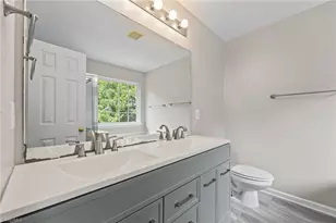 693 Triple Crown Ct, Whitsett, NC 27377 - Photo 17