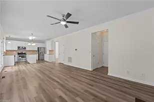 693 Triple Crown Ct, Whitsett, NC 27377 - Photo 11