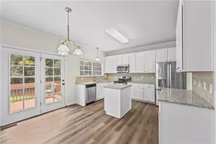 693 Triple Crown Ct, Whitsett, NC 27377 - Photo 5