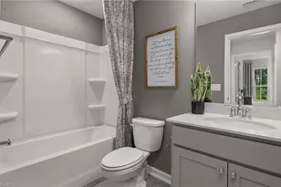 1607 Eckert Ln, Whitsett, NC 27377 - Photo 15