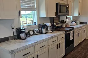 1266 Quaker Church Rd, Siloam, NC 27047 - Photo 7