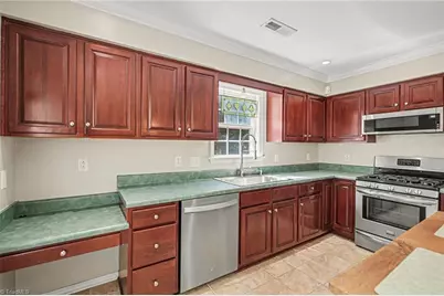 5605 Stonekirk Court, Greensboro, NC 27407 - Photo 17