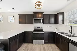 7649 Oliver Park Dr, Whitsett, NC 27377 - Photo 11