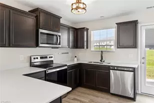 7649 Oliver Park Dr, Whitsett, NC 27377 - Photo 9