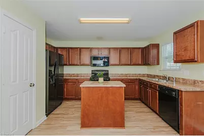 6609 Glenville Drive, Whitsett, NC 27377 - Photo 7