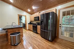 411 Cabin Cove Ln, Moravian Falls, NC 28654 - Photo 5