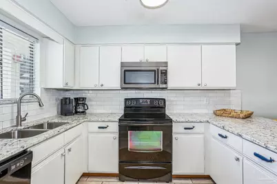 7453 Sunset Harbor Dr #2-203, Navarre Beach, FL 32566 - Photo 5