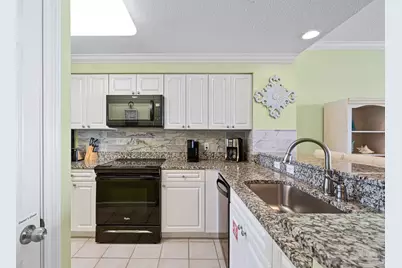 8499 Gulf Blvd #303, Navarre Beach, FL 32566 - Photo 7