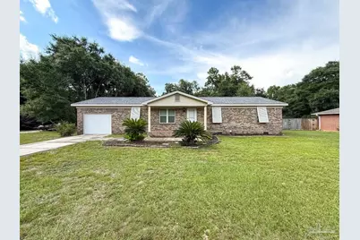7724 Rustling Pines Dr, Milton, FL 32583 - Photo 1