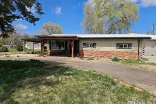 130 Balsam St, Log Lane Village, CO 80705 - Photo 1