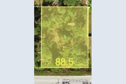 12106 Wadsworth Avenue, Port Charlotte, FL 33981 - Photo 1