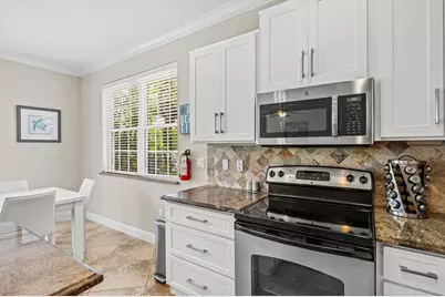 145 50th St, Holmes Beach, FL 34217 - Photo 17