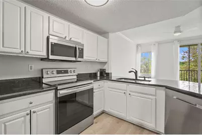 5551 Bentgrass Drive #11-117, Sarasota, FL 34235 - Photo 3