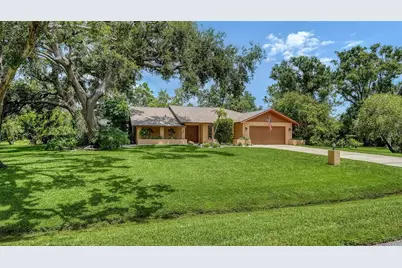 5879 Ravenwood Drive, Sarasota, FL 34243 - Photo 1