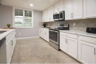 5904 Wake Forest Run #104, Bradenton, FL 34211 - Photo 11