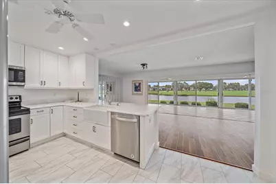 7077 W Country Club Drive N, Sarasota, FL 34243 - Photo 9