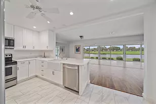 7077 W Country Club Dr N, Sarasota, FL 34243 - Photo 9