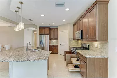 7546 Divot Loop, Lakewood Ranch, FL 34202 - Photo 23