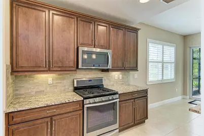 7546 Divot Loop, Lakewood Ranch, FL 34202 - Photo 25