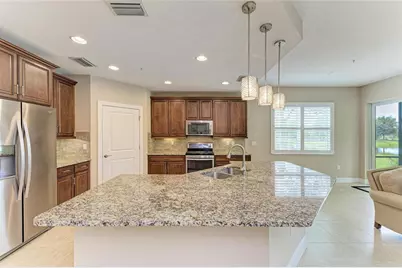 7546 Divot Loop, Lakewood Ranch, FL 34202 - Photo 27