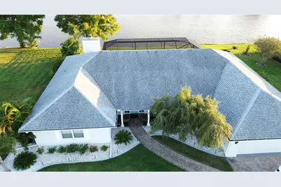 11597 SW Dallas Drive S, Lake Suzy, FL 34269 - Photo 1