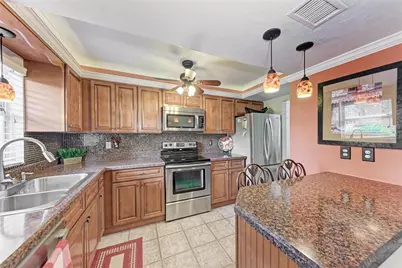 3987 Maceachen Boulevard #114, Sarasota, FL 34233 - Photo 9