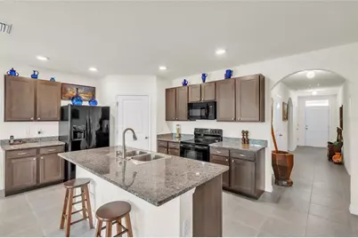 9527 Sunstone Boulevard, Thonotosassa, FL 33592 - Photo 3