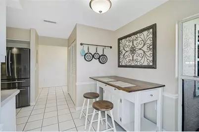 7341 Golf Pointe Circle, Sarasota, FL 34243 - Photo 13