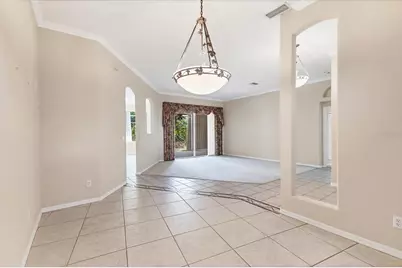 7437 Featherstone Boulevard, Sarasota, FL 34238 - Photo 9