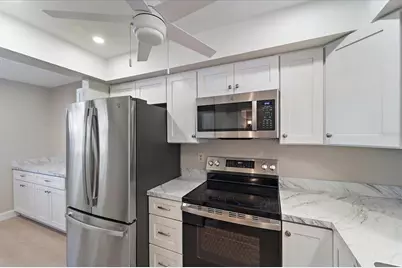 7860 Palm Aire Lane #104, Sarasota, FL 34243 - Photo 11