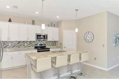 1932 W Isles Road, Port Charlotte, FL 33953 - Photo 17