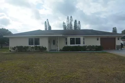 1410 Alwynne Drive, Lehigh Acres, FL 33936 - Photo 1