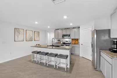 7511 Rosewood Garden Loop, Tampa, FL 33637 - Photo 7