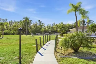 12538 SW Kingsway Cir, Lake Suzy, FL 34269 - Photo 31