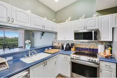 3607 E Bay Drive #211, Holmes Beach, FL 34217 - Photo 11