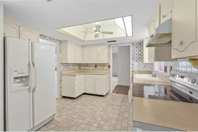 3206 Village Green Drive #1036, Sarasota, FL 34239 - Photo 25