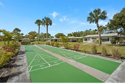 3206 Village Green Drive #1036, Sarasota, FL 34239 - Photo 53