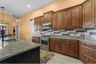 12012 Legacy Estates Boulevard, Sarasota, FL 34238 - Photo 11