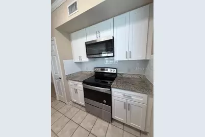 5611 Bidwell Parkway #103, Sarasota, FL 34233 - Photo 1