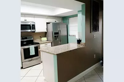 7143 Wood Creek Drive #203, Sarasota, FL 34231 - Photo 11