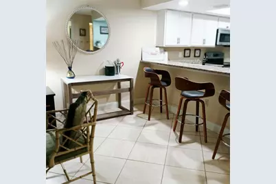 7143 Wood Creek Drive #203, Sarasota, FL 34231 - Photo 9