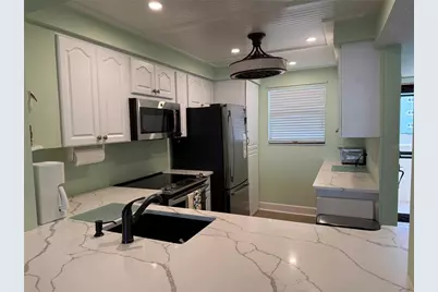 18304 Gulf Boulevard #105, Redington Shores, FL 33708 - Photo 3